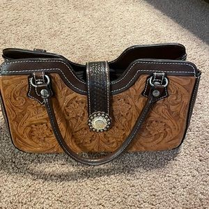 Montana Silversmith leather purse, great condition.